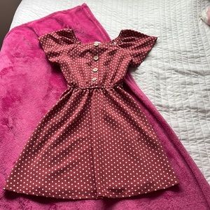 Get this burgundy dress with white polkadots from H&M!